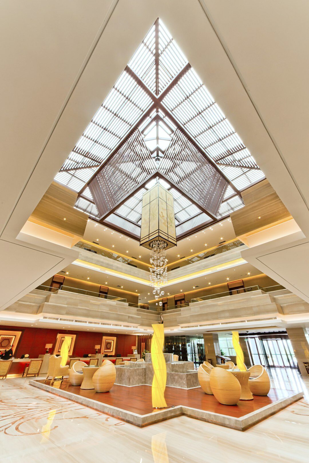 luxury hotel lobby with chandeliers