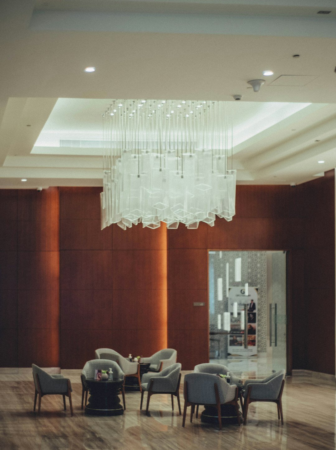 luxury hotel lobby with chandeliers